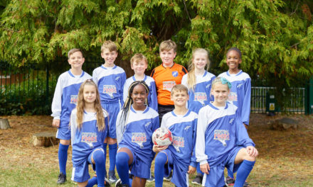 Pupils receive new football kit, thanks to Central Foods