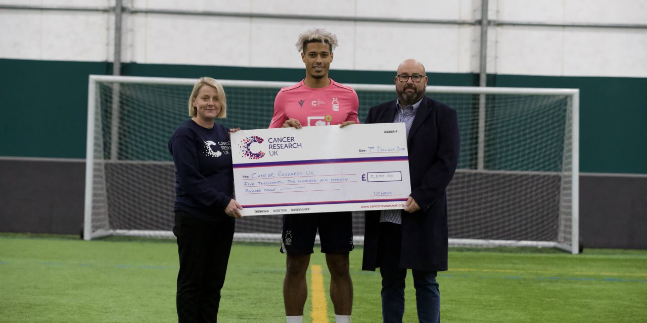 Nottingham Forest’s Lyle Taylor nets milestone cash for cancer, boosted by club sponsor UK Meds