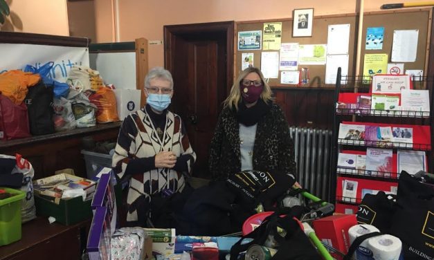 Bourne Foodbank welcomes generous donation from local housing developer