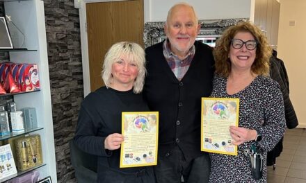 Arnold hair salon pledges year of support to dementia group