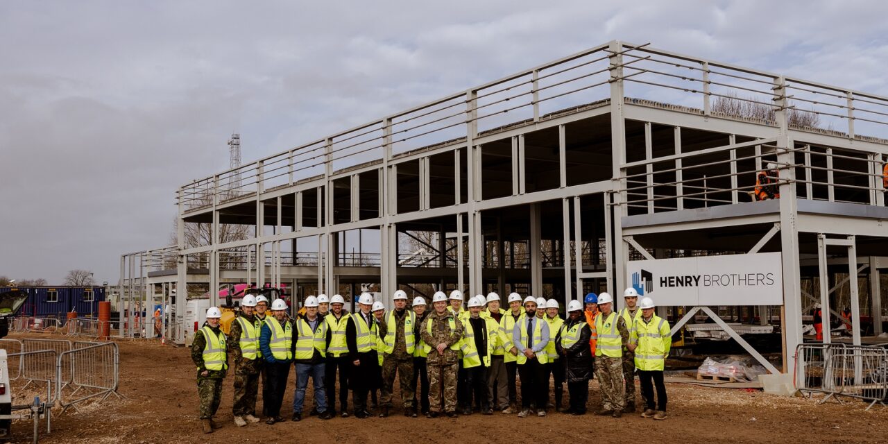 Henry Brothers stages topping out ceremony at Beacon Barracks