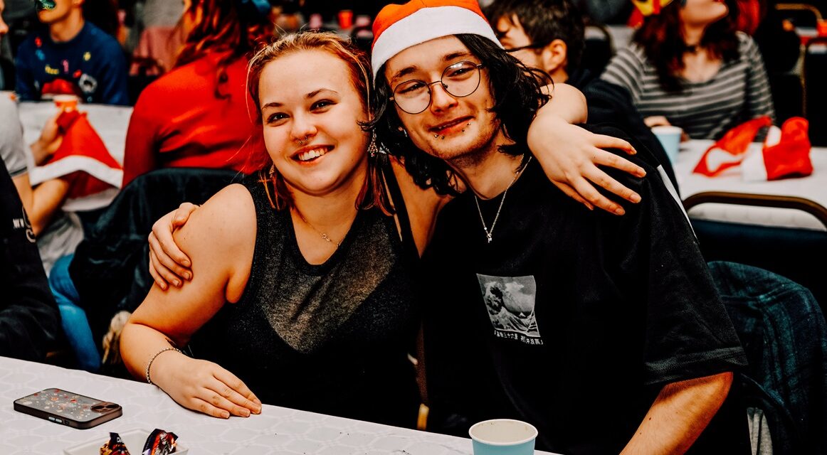 Young adults who grew up in care come together for community Christmas party in Burton