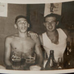John Holehouse (right) with a fellow soldier enjoying a break from duty at Raffles bar in the former British colony of Malaya in 1956.