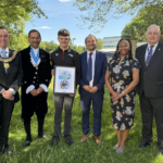 Deaf racing driver shares message of resilience with Derby pupils